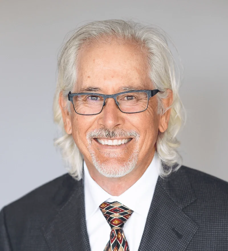 Portrait of Dr. Charles Gallagher, DMD, dentist at Academy Dental Care.